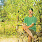 Richard Reames, in the beginnings of a living chair on his Oregon property.