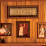 Family photographs hanging on the walls of Steve Snider’s home capture images of his dad, Bill. For Steve, however, the most tangible memories revolve around the family farm that continues to operate today because of his father’s efforts.
