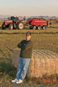Custom baler Reuben Wood turns out around 20,000 large square bales and up to 50,000 small square bales annually.