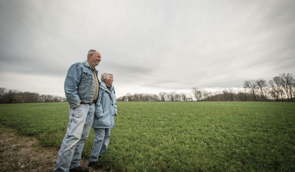 Lee Gilmore and his Mother look out over their fields.