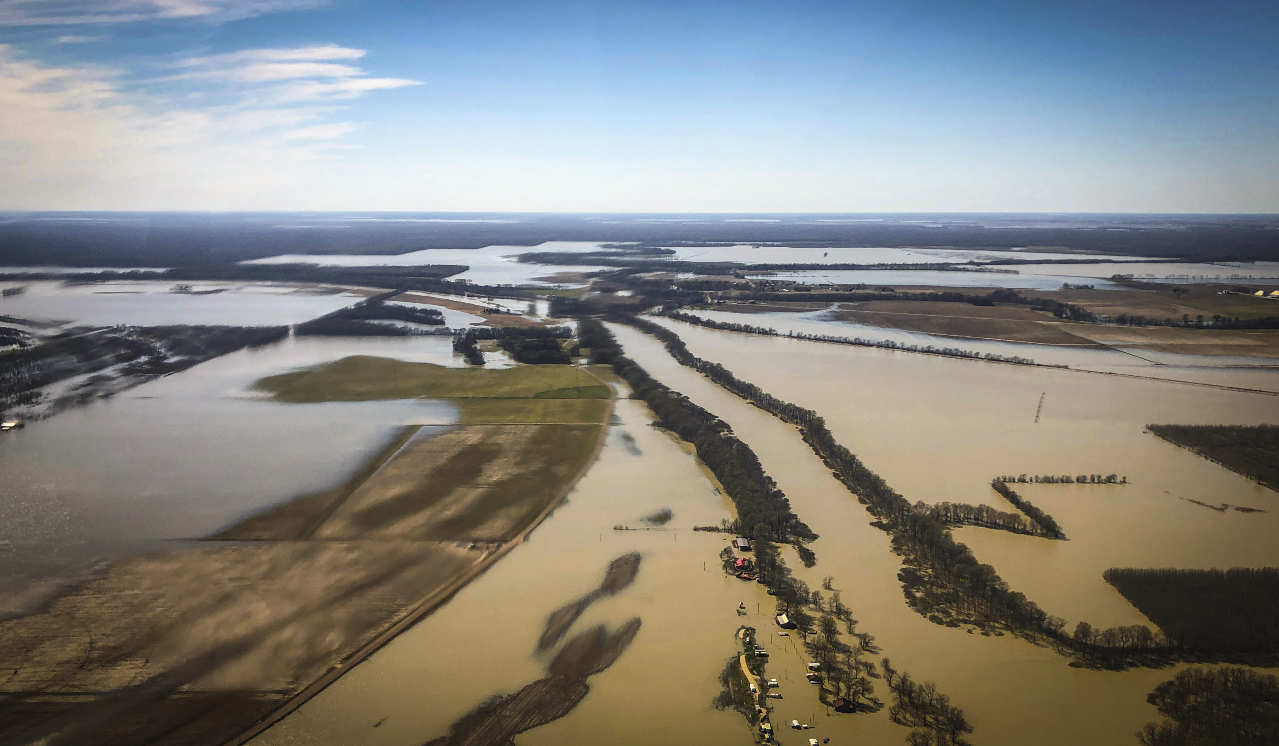 Backwater flooding covers stretches of farm lands near Yazoo City, Miss., Sunday, March 17, 2019, as seen in this aerial photograph. Various communities in the Mississippi Delta are combatting both Mississippi River flooding and backwater flooding that are affecting homes, businesses and farm lands. (AP Photo/Holbrook Mohr)